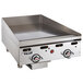 A Vulcan stainless steel countertop gas griddle with knobs.