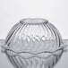 A clear glass GET tulip bowl with a curved edge.