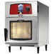 A large silver Vulcan Mini-JETR electric combi oven with a red and black display.