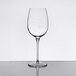 A close up of a Reserve by Libbey Acura Renaissance wine glass with a silver rim on a reflective surface.