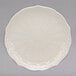 A white 10 Strawberry Street new bone china bread and butter plate with a circular design.