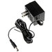 A black Taylor power adapter with a cord and a plug.