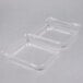 Two Durable Packaging clear hinged lid plastic containers.