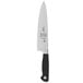 A Mercer Culinary Genesis chef knife with a black handle.
