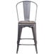 A Flash Furniture metal counter height stool with a square wood seat.