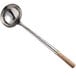 A stainless steel Town wok ladle with a wooden handle.