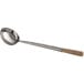 A Town stainless steel wok ladle with a wooden handle.