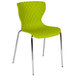 A citrus green plastic chair with chrome legs.