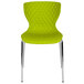 A Flash Furniture Lowell contemporary citrus green plastic stackable chair with chrome legs.