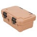 A tan plastic Cambro food pan carrier with black handles.