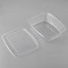 A clear PLA plastic rectangular deli container with lid.