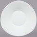 A CAC Super White triangular porcelain salad plate with a circle.