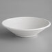 A white Eco-Products compostable sugarcane noodle bowl on a gray surface.