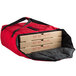 A red Cambro Insulated Pizza Delivery GoBag with three pizza boxes inside.