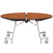 A National Public Seating round cafeteria table with a metal frame and wheels.