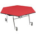 A hexagonal plywood cafeteria table with a red top and black powder coated frame.