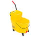 A yellow Rubbermaid mop bucket with a side press wringer and a handle.