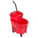 A red Rubbermaid mop bucket with a black handle.
