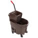 A brown Rubbermaid mop bucket with a handle and wheels.