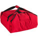 A red Cambro insulated delivery bag with black straps.