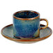 A blue and brown Bon Chef Tavola Marea porcelain tea saucer.