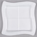 A white square Fineline disposable plastic tray with four sections.