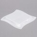 A white square Fineline disposable plastic tray.
