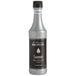A bottle of Monin Premium Coconut Concentrated Flavor with a black label.