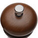 A Chef Specialties walnut pepper mill with a silver knob.