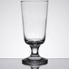 A close-up of an Anchor Hocking Excellency highball glass with a small rim.