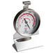 A Comark 2" dial oven thermometer, a round metal gauge.