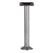 A close-up of a silver metal BFM Seating Alpha bolt-down table base.