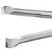 Two Vollrath stainless steel Pom Tongs.