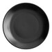 A close-up of an Acopa matte black stoneware plate.