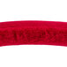 A red stanchion rope with satin ends on a white background.
