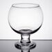 A Libbey Super Globe Fish Bowl Glass on a table.