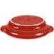 A red oval Fiesta china baker with a white interior and lid.