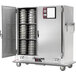 A Metro heated banquet cabinet with doors open holding stacked plates.
