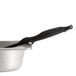 A stainless steel bowl with a black Vollrath Spoodle in it.