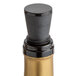 A close-up of a bottle with a Franmara black wine stopper in it.