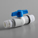 A white plastic ball valve with a blue handle.