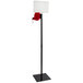 A black pole with a square black and white Take-a-Number dispenser with a red hat on top.