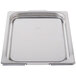 A Vollrath stainless steel tray with a lid.