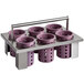 A metal tray with a Steril-Sil stainless steel rack and violet plastic containers with holes in them.