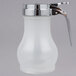 A Tablecraft clear plastic syrup dispenser with a chrome metal top and handle.