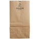 A brown Duro paper bag with black text that reads "Husky Dubl Life"