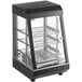 A black and clear glass Avantco countertop hot food display case with shelves.