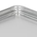 A Chicago Metallic wire-in-rim aluminum sheet pan on a white surface.