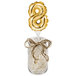 A jar with a gold foil number 8 balloon in it.