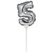 A silver foil number 5 on a stick.
